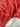 Close-up van de Bubble & Blend Crimson Petals woondeken met roze-rode bloemenprint en zachte fleece binnenzijde. Luxe uitstraling en fijne textuur.