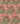 Een krachtig tropisch patroon met een mix van groene bladeren en diverse bloemen op een koraalachtergrond, dat een zomerse, exotische uitstraling geeft aan de Keukendoek Graceful Elegance van Bubble & Blend.