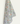 Een Keukendoek Bunny Breeze van Bubble & Blend, elegant gedrapeerd tegen een witte achtergrond, met een zachte waterval van pastelkleurige bloemen met superieure absorptie.