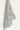 Een Keukendoek Bunny Breeze van Bubble & Blend, elegant gedrapeerd tegen een witte achtergrond, met een zachte waterval van pastelkleurige bloemen met superieure absorptie.