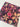Close-up van Spiced Petals bloemenprint in warme roze, oranje en bruine tinten – Bubble & Blend woonaccessoires en deurmatten